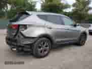 2013 Hyundai Santa Fe Sport с VIN 5XYZU3LB7DG014147, выставлен на аукционе Copart как лот 82160175 с пробегом 149 645 миль миль и Списание • Salvage title. История ставок и продаж доступна на DreamBid. Изображение 3.