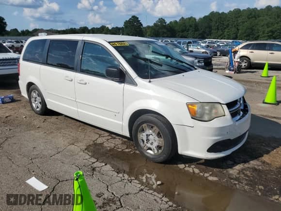 2012 Dodge Grand Caravan SE z VIN 2C4RDGBG5CR343718, wystawiony jako Copart lot #62005435 z przebiegiem 129 385 mil mil oraz Szkoda całkowita • Salvage title. Historia ofert i sprzedaży dostępna na DreamBid. Obrazek 4.