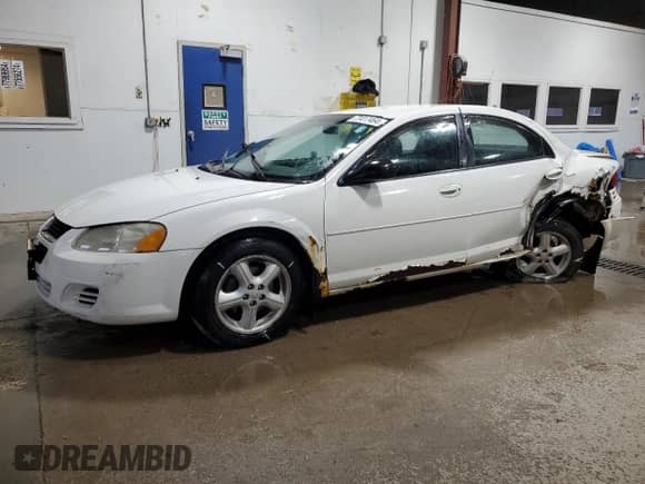 2006 Dodge Stratus SXT with VIN 1B3EL46R36N180291, listed as a Copart auction lot 77417464 with 182,971 mi miles and Salvage title. Bid and sale history available at DreamBid. Image 1.