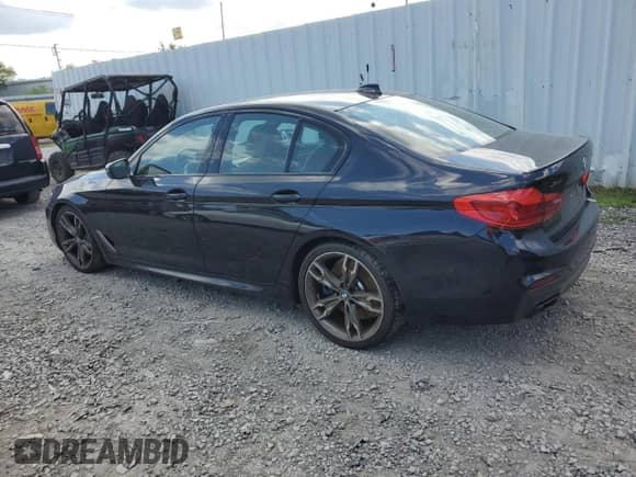 2020 BMW 5 Series M550i xDrive with VIN WBAJS7C04LBN96223, listed as a Copart auction lot 69381004 with 60,912 mi miles and Salvage title. Bid and sale history available at DreamBid. Image 2.