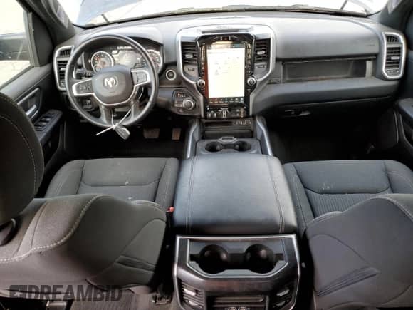 2023 Ram 1500 Big Horn with VIN 1C6SRFMT7PN644041, listed as a Copart auction lot 87510025 with 32,190 mi miles and Salvage title. Bid and sale history available at DreamBid. Image 8.