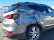 2013 Hyundai Santa Fe Sport z VIN 5XYZUDLA3DG077162, wystawiony jako IAAI lot #43326274 z przebiegiem Nie podano mil oraz . Historia ofert i sprzedaży dostępna na DreamBid. Obrazek 17.