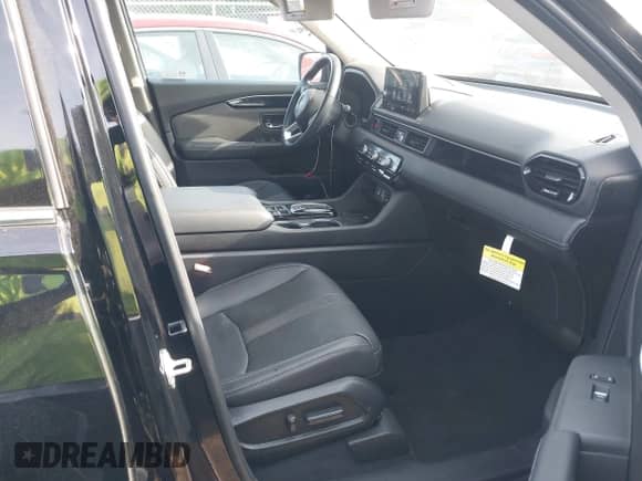 2023 Honda Pilot Touring с VIN 5FNYG2H77PB002996, выставлен на аукционе IAAI как лот 42070607 с пробегом 31 875 миль миль и . История ставок и продаж доступна на DreamBid. Изображение 5.