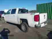 2018 Chevrolet Silverado 1500 LT with VIN 3GCUKREC3JG633219, listed as a IAAI auction lot 43452248 with Not provided miles and . Bid and sale history available at DreamBid. Image 3.