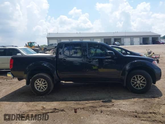 2018 Nissan Frontier SV z VIN 1N6AD0EV3JN733738, wystawiony jako IAAI lot #42603269 z przebiegiem 105 723 mil mil oraz . Historia ofert i sprzedaży dostępna na DreamBid. Obrazek 13.