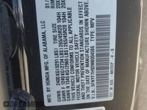 2021 Honda Passport Touring with VIN 5FNYF7H92MB004586, listed as a Copart auction lot 70409535 with 57,226 mi miles and Salvage title. Bid and sale history available at DreamBid. Image 12.