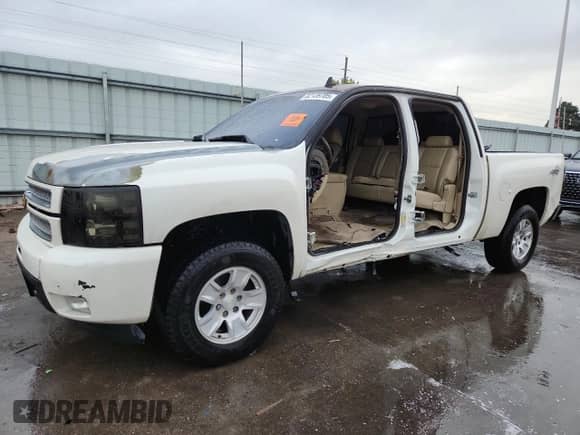 2013 Chevrolet Silverado 1500 LTZ with VIN 3GCPKTE72DG131724, listed as a Copart auction lot 82139705 with 183,083 mi miles and Salvage title. Bid and sale history available at DreamBid. Image 1.