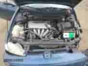 1999 Chevrolet Prizm z VIN 1Y1SK5281XZ414148, wystawiony jako Copart lot #71731384 z przebiegiem 224 527 mil mil oraz Szkoda całkowita • Salvage title. Historia ofert i sprzedaży dostępna na DreamBid. Obrazek 11.