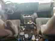 2004 Chevrolet Express Passenger with VIN 1GBFG15T041233492, listed as a Copart auction lot 82193815 with 219,338 mi miles and Salvage title. Bid and sale history available at DreamBid. Image 8.