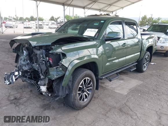 2022 Toyota Tacoma SR5 with VIN 3TMAZ5CN8NM180525, listed as a IAAI auction lot 42750259 with 52,414 mi miles and . Bid and sale history available at DreamBid. Image 2.