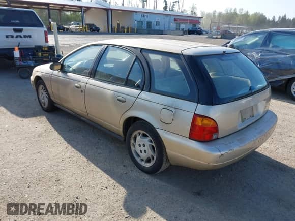 1996 Saturn SW with VIN 1G8ZK8270TZ292057, listed as a IAAI auction lot 42100826 with 207,561 mi miles and . Bid and sale history available at DreamBid. Image 3.