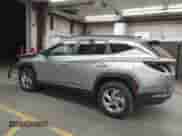 2022 Hyundai Tucson SEL with VIN 5NMJBCAEXNH048557, listed as a IAAI auction lot 43398311 with 19,872 mi miles and . Bid and sale history available at DreamBid. Image 14.