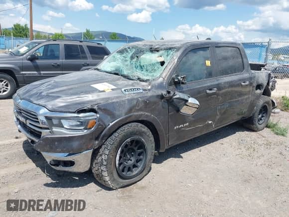2021 Ram 1500 Laramie z VIN 1C6SRFJT1MN805824, wystawiony jako IAAI lot #42407592 z przebiegiem Nie podano mil oraz . Historia ofert i sprzedaży dostępna na DreamBid. Obrazek 17.
