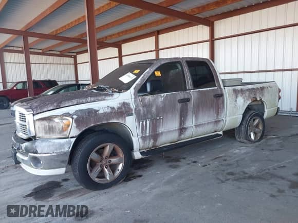 2007 Dodge 1500 SLT with VIN 1D7HU18247S205179, listed as a IAAI auction lot 43504172 with 190,287 mi miles and . Bid and sale history available at DreamBid. Image 2.