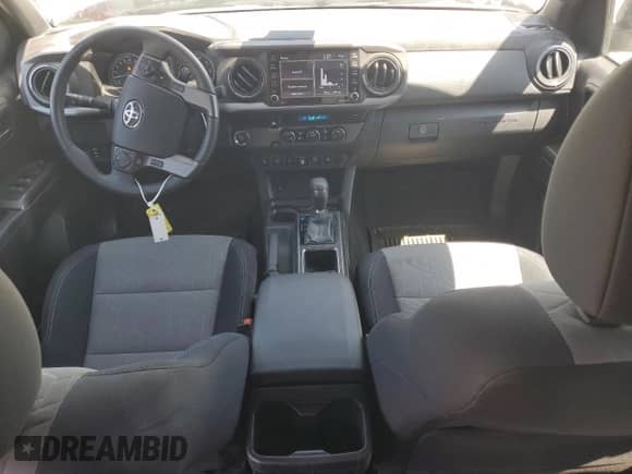 2021 Toyota Tacoma SR5 с VIN 3TMBZ5DN4MM028484, выставлен на аукционе Copart как лот 59301905 с пробегом 76 273 миль миль и Списание • Salvage title. История ставок и продаж доступна на DreamBid. Изображение 8.