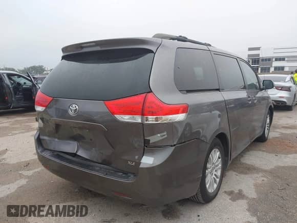 2013 Toyota Sienna XLE AAS with VIN 5TDYK3DCXDS302031, listed as a IAAI auction lot 43111515 with 168,838 mi miles and . Bid and sale history available at DreamBid. Image 4.