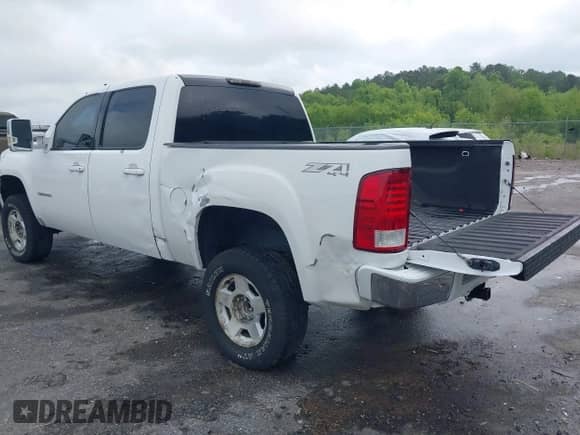 2010 GMC Sierra 1500 SLT with VIN 3GTRKWE37AG184132, listed as a IAAI auction lot 42106936 with 243,711 mi miles and . Bid and sale history available at DreamBid. Image 3.