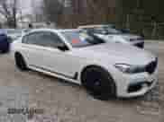 2017 BMW 7 Series 740e xDrive with VIN WBA7J2C36HG497830, listed as a Copart auction lot 79948304 with 43,029 mi miles and Salvage title. Bid and sale history available at DreamBid. Image 4.