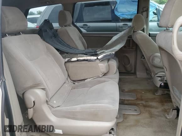 2005 Toyota Sienna CE с VIN 5TDZA23C15S303833, выставлен на аукционе Copart как лот 69789125 с пробегом 216 728 миль миль и Списание • Salvage title. История ставок и продаж доступна на DreamBid. Изображение 11.