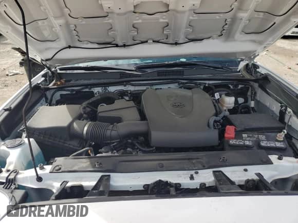 2023 Toyota Tacoma SR5 z VIN 3TMAZ5CN4PM217525, wystawiony jako Copart lot #82028615 z przebiegiem 22 100 mil mil oraz Szkoda całkowita • Salvage title. Historia ofert i sprzedaży dostępna na DreamBid. Obrazek 11.