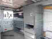 2010 Ford Econoline Cargo Commercial with VIN 1FTNE2EL1ADA10309, listed as a IAAI auction lot 41833946 with 136,578 mi miles and . Bid and sale history available at DreamBid. Image 14.