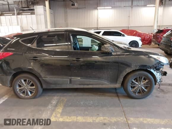 2014 Hyundai Tucson Limited with VIN KM8JU3AGXEU859629, listed as a IAAI auction lot 42441509 with 78,946 mi miles and . Bid and sale history available at DreamBid. Image 13.