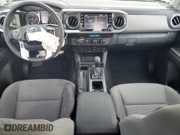 2022 Toyota Tacoma SR z VIN 3TYSZ5AN0NT077417, wystawiony jako Copart lot #62022335 z przebiegiem 9 254 mil mil oraz Nie do naprawy • Non repairable. Historia ofert i sprzedaży dostępna na DreamBid. Obrazek 8.