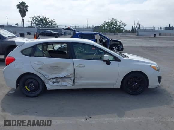 2014 Subaru Impreza Limited with VIN JF1GPAG69E8272751, listed as a IAAI auction lot 43401749 with 96,830 mi miles and . Bid and sale history available at DreamBid. Image 13.