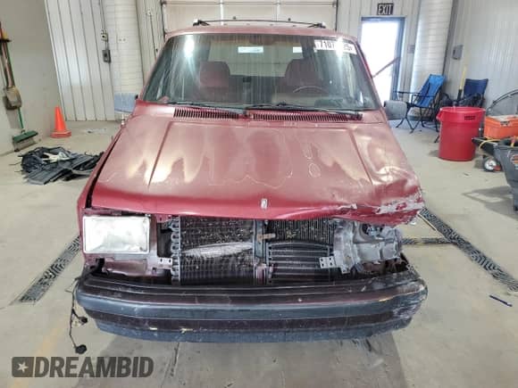 1989 Dodge Caravan with VIN 2B4FK553XKR379082, listed as a Copart auction lot 71077325 with 163,844 mi miles and Salvage title. Bid and sale history available at DreamBid. Image 5.