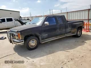 1992 GMC Sierra 1500 z VIN 2GTHC39NXN1556192, wystawiony jako Copart lot #55469485 z przebiegiem 128 938 mil mil oraz Czysty tytuł • Clean title. Historia ofert i sprzedaży dostępna na DreamBid. Obrazek 1.