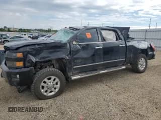 2015 Chevrolet Silverado 3500HD LTZ с VIN 1GC4K0E83FF677902, выставлен на аукционе Copart как лот 58402085 с пробегом Не указан миль и Списание • Salvage title. История ставок и продаж доступна на DreamBid. Изображение 1.