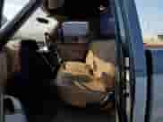 1988 Ford F-150 z VIN 1FTDF15Y3JPB49810, wystawiony jako Copart lot #68766294 z przebiegiem 67 315 mil mil oraz Szkoda całkowita • Salvage title. Historia ofert i sprzedaży dostępna na DreamBid. Obrazek 7.