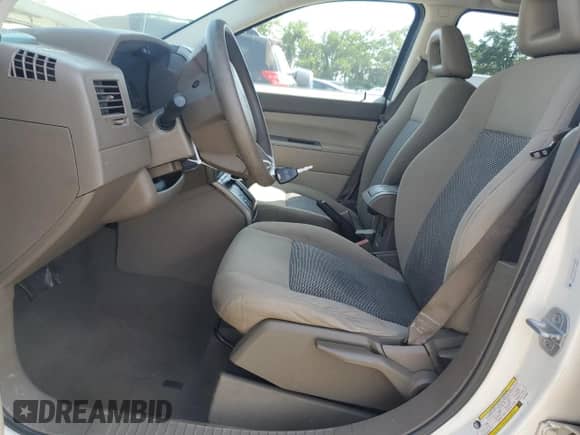 2007 Jeep Compass Sport with VIN 1J8FT47W27D119053, listed as a Copart auction lot 66326715 with 140,065 mi miles and Salvage title. Bid and sale history available at DreamBid. Image 7.