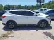 2014 Hyundai Santa Fe with VIN 5XYZU3LB3EG208031, listed as a IAAI auction lot 42865845 with 106,523 mi miles and . Bid and sale history available at DreamBid. Image 13.