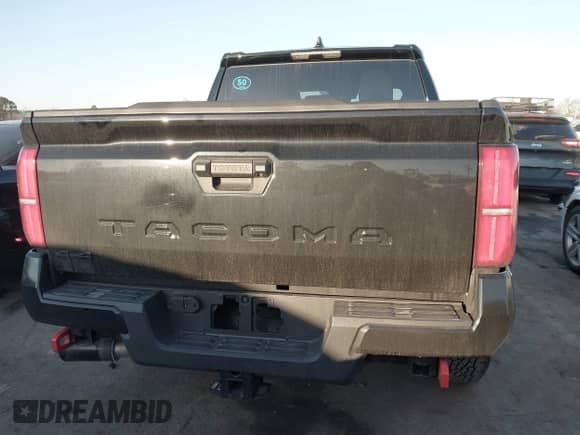 2024 Toyota Tacoma SR5 with VIN 3TYLB5JN3RT032583, listed as a IAAI auction lot 41404527 with 7,130 mi miles and . Bid and sale history available at DreamBid. Image 16.