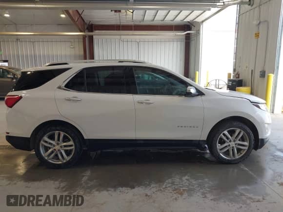 2019 Chevrolet Equinox Premier with VIN 2GNAXXEV4K6179450, listed as a IAAI auction lot 42759991 with 164,806 mi miles and . Bid and sale history available at DreamBid. Image 13.
