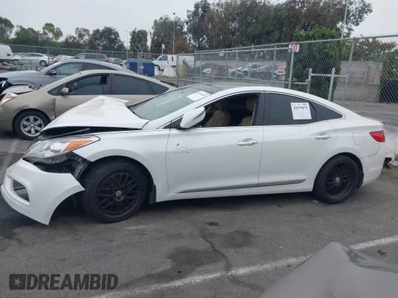 2013 Hyundai Azera с VIN KMHFH4JG3DA207225, выставлен на аукционе IAAI как лот 42979875 с пробегом Не указан миль и . История ставок и продаж доступна на DreamBid. Изображение 13.