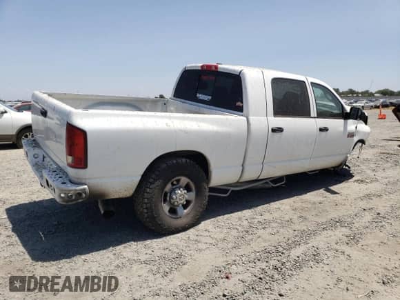 2009 Dodge 2500 SLT с VIN 3D7KS29L89G537421, выставлен на аукционе Copart как лот 58276555 с пробегом 309 706 миль миль и Списание • Salvage title. История ставок и продаж доступна на DreamBid. Изображение 3.