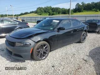 2019 Dodge Charger SXT with VIN 2C3CDXBG4KH715385, listed as a Copart auction lot 62315995 with 157,587 mi miles and Salvage title. Bid and sale history available at DreamBid. Image 1.