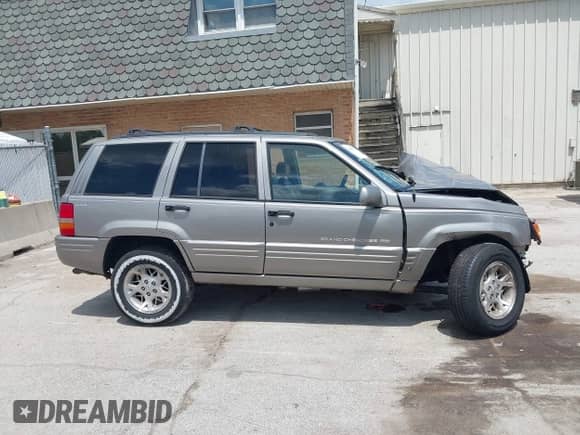 1998 Jeep Grand Cherokee Limited с VIN 1J4GZ78Y5WC308600, выставлен на аукционе IAAI как лот 42688753 с пробегом Не указан миль и . История ставок и продаж доступна на DreamBid. Изображение 13.