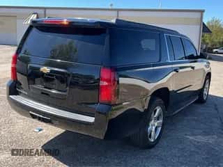 2017 Chevrolet Suburban LT with VIN 1GNSCHKC8HR248078, listed as a Copart auction lot 89697475 with 143,147 mi miles and Clean title. Bid and sale history available at DreamBid. Image 4.