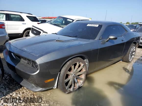 2012 Dodge Challenger R/T with VIN 2C3CDYBT0CH275489, listed as a Copart auction lot 67852624 with 100,406 mi miles and Non repairable. Bid and sale history available at DreamBid. Image 1.