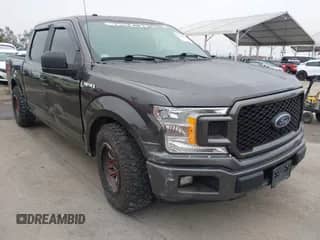 2018 Ford F-150 XL with VIN 1FTEW1CPXJKF05181, listed as a IAAI auction lot 42433178 with 97,101 mi miles and . Bid and sale history available at DreamBid. Image 1.