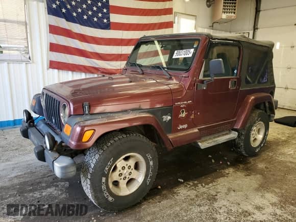 2001 Jeep Wrangler Sahara z VIN 1J4FA59S11P334534, wystawiony jako Copart lot #90651005 z przebiegiem 155 822 mil mil oraz Czysty tytuł • Clean title. Historia ofert i sprzedaży dostępna na DreamBid. Obrazek 1.