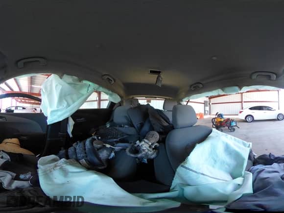2012 Chevrolet Sonic LS z VIN 1G1JA6SH7C4219017, wystawiony jako IAAI lot #41881402 z przebiegiem Nie podano mil oraz . Historia ofert i sprzedaży dostępna na DreamBid. Obrazek 18.