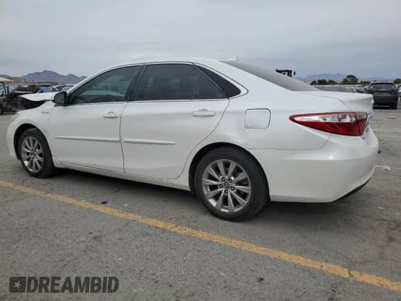 2015 Toyota Camry LE с VIN 4T1BD1FKXFU167796, выставлен на аукционе Copart как лот 70953095 с пробегом 128 819 миль миль и Списание • Salvage title. История ставок и продаж доступна на DreamBid. Изображение 2.