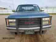 1991 GMC Sierra 1500 SLT z VIN 2GTEK19Z4M1542137, wystawiony jako Copart lot #68024074 z przebiegiem 347 281 mil mil oraz Szkoda całkowita • Salvage title. Historia ofert i sprzedaży dostępna na DreamBid. Obrazek 5.
