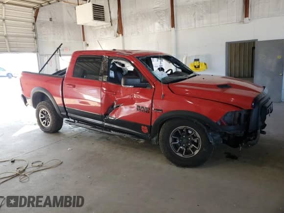 2016 Ram 1500 Rebel z VIN 1C6RR7YT0GS200631, wystawiony jako Copart lot #71961625 z przebiegiem Nie podano mil oraz Szkoda całkowita • Salvage title. Historia ofert i sprzedaży dostępna na DreamBid. Obrazek 4.