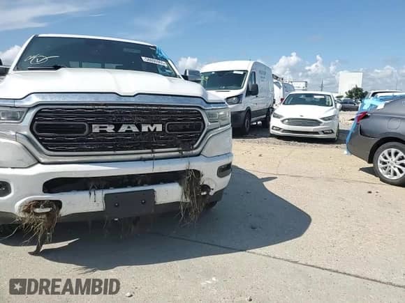 2022 Ram 1500 Limited z VIN 1C6SRFHT3NN363068, wystawiony jako Copart lot #58806965 z przebiegiem Nie podano mil oraz Szkoda całkowita • Salvage title. Historia ofert i sprzedaży dostępna na DreamBid. Obrazek 13.