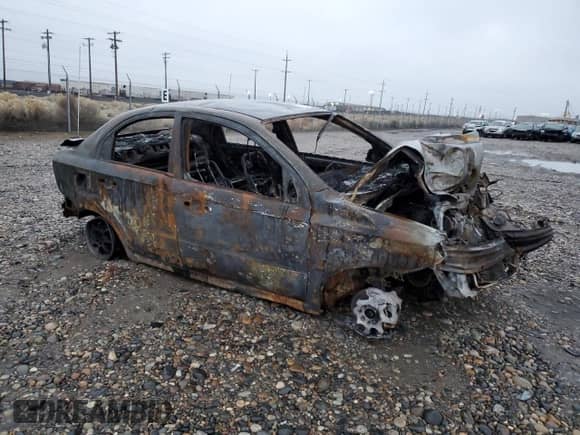 2011 Chevrolet Aveo 1LT z VIN KL1TD5DE4BB175516, wystawiony jako Copart lot #80169054 z przebiegiem Nie podano mil oraz Szkoda całkowita • Salvage title. Historia ofert i sprzedaży dostępna na DreamBid. Obrazek 4.